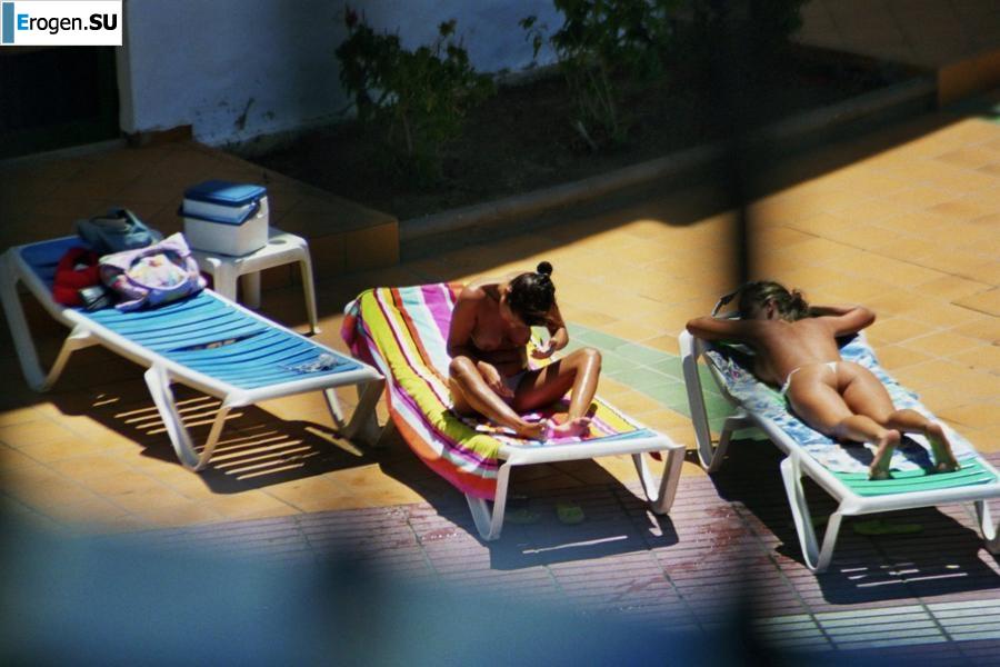 Girls sunbathe topless near the pool. Part 2. Photo 30