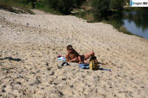 Three nudists on the river bank. Thumb 5