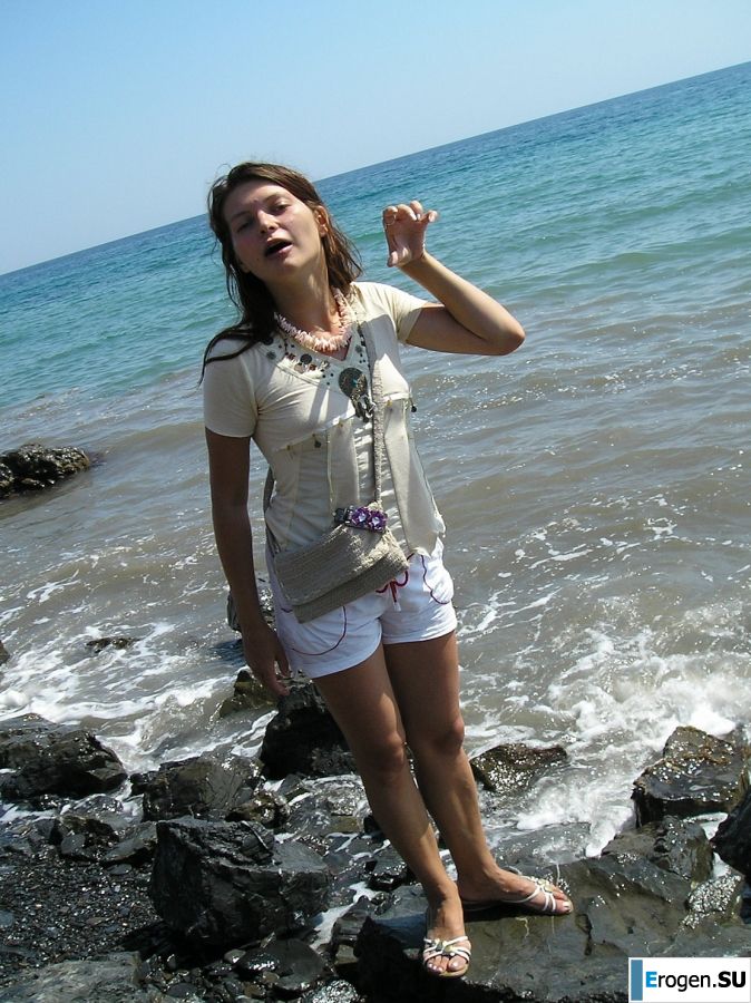 without a swimsuit on a rocky shore. Photo 37