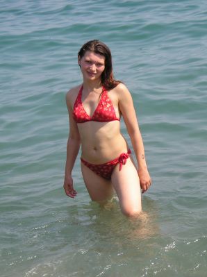 without a swimsuit on a rocky shore. Thumb 26