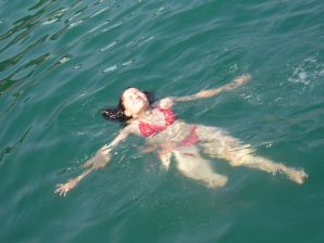 without a swimsuit on a rocky shore. Thumb 6