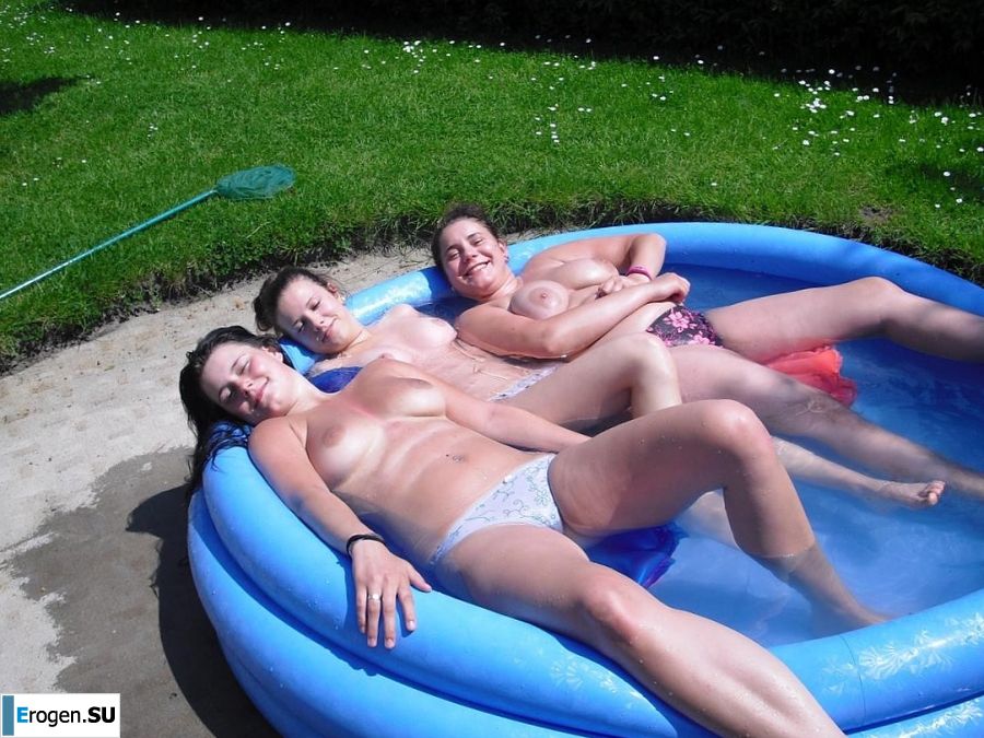 three girlfriends sunbathe in the yard with bare breasts. Part 2. Photo 17