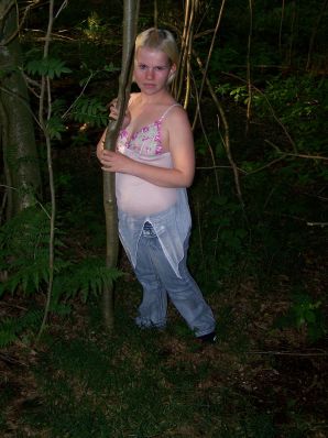 Appetizing magnificent blonde spread her legs right on the grass. Thumb 5